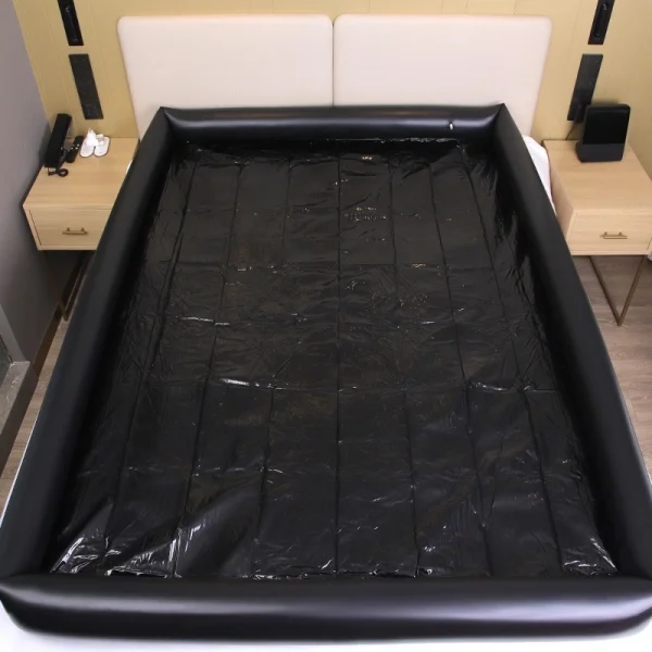 Inflatable water bed sex foreplay - Image 2